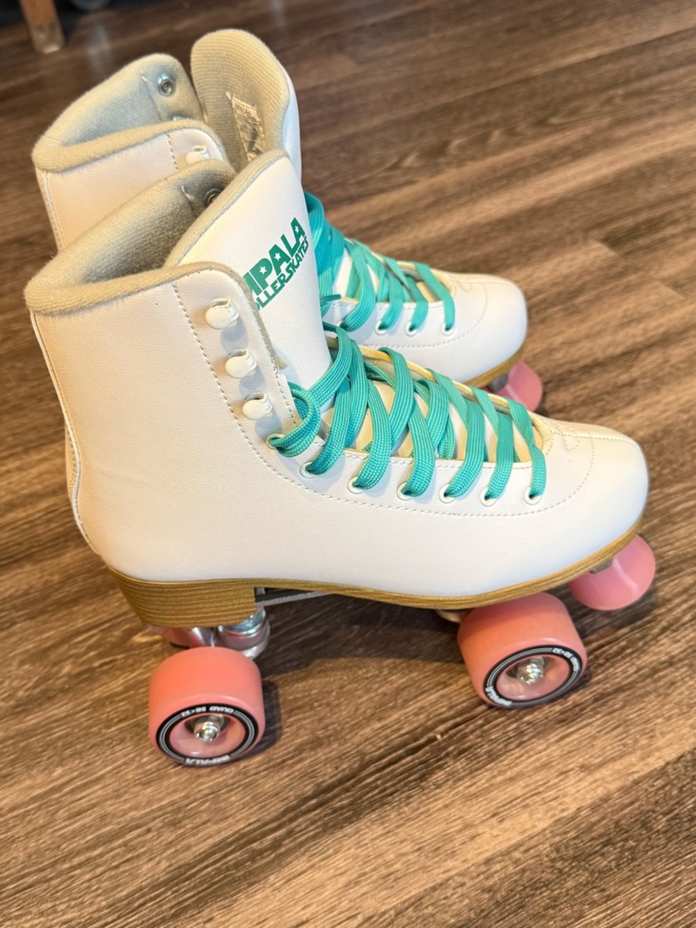 Womens Impala Roller Skates with Aqua Laces and Pink Wheels